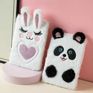 Close-up detail of soft plush A5 notebooks featuring cute rabbit and panda embroidery designs