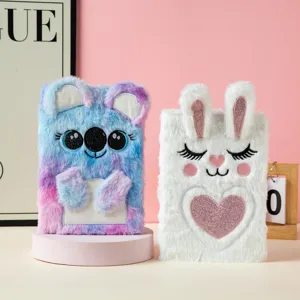 Close-up of plush A5 notebooks featuring cute koala and bunny embroidery details
