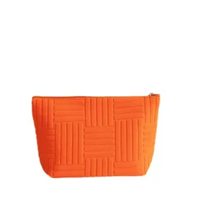 Neceser de maquillaje naranja grande de tela de toalla con diseño trenzado de viaje
