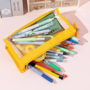 Large capacity yellow transparent mesh pencil case filled with colorful pens for students