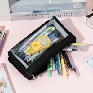 Close-up detail view of a black mesh pencil case filled with colorful stationery items