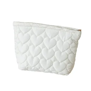 Elegant white quilted heart-shaped cosmetic bag for makeup and lipstick storage organizer