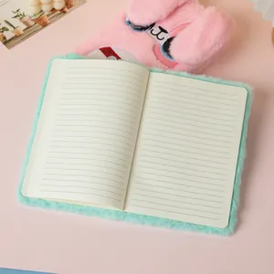 Close-up of plush rabbit notebook showing lined inner pages and soft faux fur texture