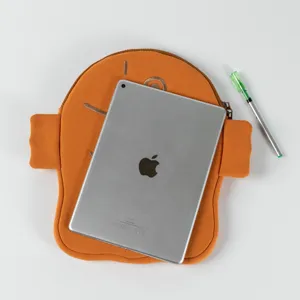 Detail view of the cute Taiyaki plush iPad sleeve with a tablet for scale