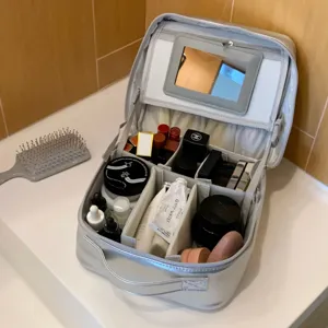 Spacious silver PU leather makeup bag with built-in mirror and adjustable dividers