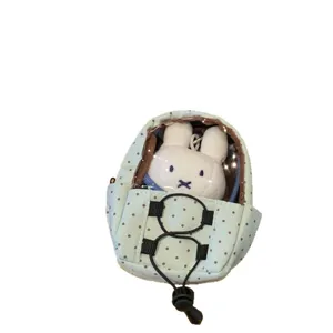 Polka dot mini doll carrier backpack keychain with adorable plush rabbit charm insert
