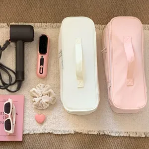 Portable double-layer hair dryer storage bag for hair tools, shown in pink and cream.
