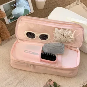 Detailed interior view of pink double-layer portable hair dryer storage bag