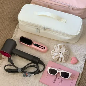 Portable large capacity storage bag for hair dryer and curling iron in detail view