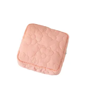 Pink floral quilted sanitary napkin storage bag for feminine care and makeup items