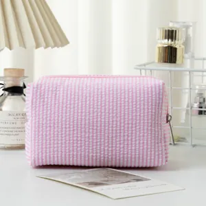 Rosa und weiß gestreifte Seersucker-Kosmetiktasche mit Reißverschluss für Reisen