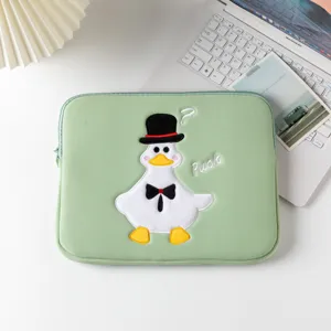 Charming mint green tablet sleeve with embroidered duck design and soft fabric texture