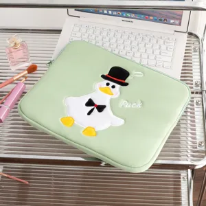 Light green tablet sleeve with cute embroidered duck character and secure zipper closure