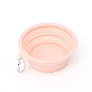 Pratica ciotola pieghevole rosa in silicone per cani con moschettone da viaggio all'aperto.