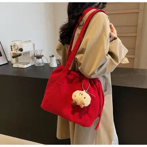 Red corduroy tote bag with drawstring, casual large capacity shoulder bag for women daily commute.