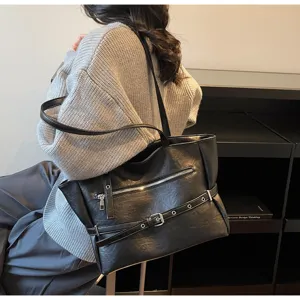 Retro black soft leather large capacity tote bag shown on a model for daily use.