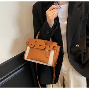 Retro canvas and PU leather colorblock handbag, fashion top handle crossbody bag for women.