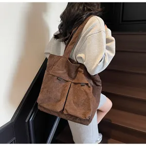 Retro corduroy shoulder bag, large capacity multi-compartment casual commuting tote handbag.