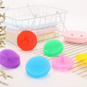 Close-up of vibrant silicone pet grooming and massage brushes for bathing cats and dogs