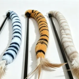 Close-up of three plush striped cat teaser wands with feathers in different colors.