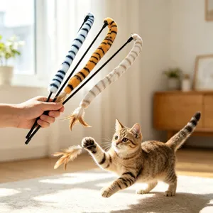 Detailed action shot of tiger-striped plush cat teaser wands with feathers and a kitten