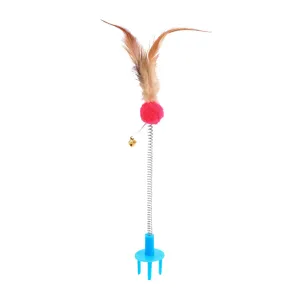 Detailansicht eines Feder-Spielzeugs für Katzen mit Glocke und einem rosa Pompon