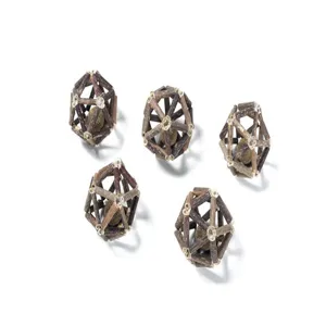 Five handmade woven silvervine cat toys with catnip balls inside on white background