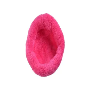 Detailed top view of a plush hot pink hamster nest with thick warm lining for small pets