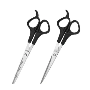 Professional pet grooming scissors set with black handles for dogs and cats.
