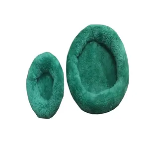 Detailed view of two green plush warm beds for hamsters and guinea pigs, winter comfort