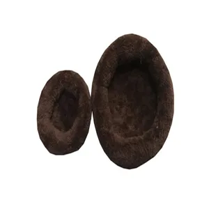 Detail view of two different sized brown plush warm beds for hamsters and small pets