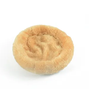 Soft plush circular pet bed for small animals like hamsters and rabbits in warm beige