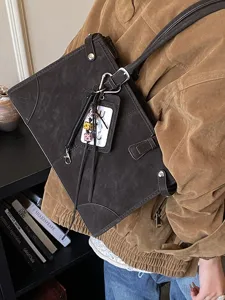 Vintage dark brown large capacity commuter tote bag with decorative charms and shoulder strap