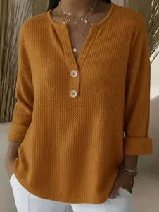 Waffle knit V-neck long sleeve top with front buttons, casual mustard yellow pullover shirt.