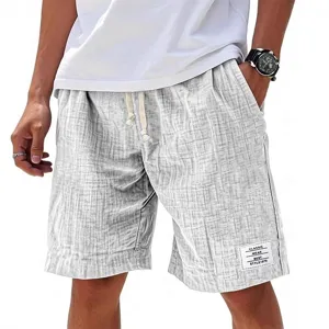 Short de plage texture pour homme style decontracte avec cordon de serrage et etiquette