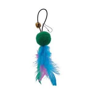 Detail view of a colorful cat toy teaser replacement head with feathers and small bell
