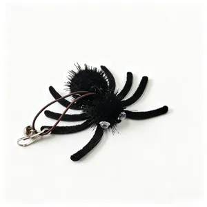 Macro view of plush Halloween spider cat toy with elastic cord and metal clip attachment