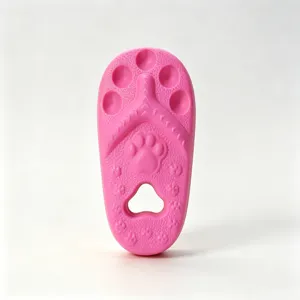 Pink flip-flop shaped pet chew toy, durable teething toy for dogs and cats with paw print details.