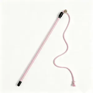 Detailed view of the pink cat teaser wand featuring a soft cotton rope and gold bell.
