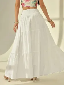 Solid color white A-line long skirt, high waist tiered design, elegant vacation style.