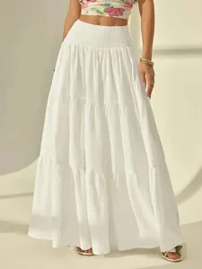 Solid white tiered maxi skirt for women, high-waist elastic bohemian long skirt for summer resort vacation.