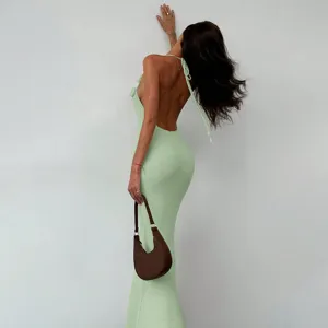 Detail view of the elegant sexy backless knitted halter maxi dress for ideal beach wear.
