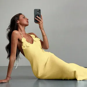 Solid yellow crochet halter maxi dress with floral appliques for women beachwear stylish.