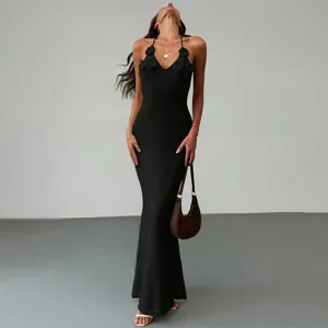 Elegant black halter maxi dress with 3d floral details for stylish beach and summer wear.