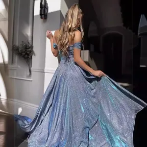 Detail shot of the sparkling blue sequin evening dress, capturing the stunning texture and drape.