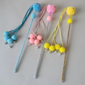 Interactive cat teaser wand toy with plush pom poms, colorful strings and bells for pets.