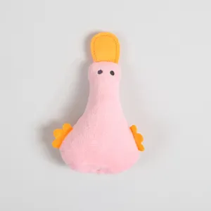 Detailed close-up of the cute pink plush duck pet toy, showing soft fabric texture.