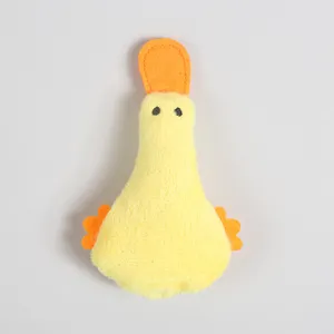Close-up detail of cute yellow duck plush pet toy, soft fabric texture for cats and dogs play.