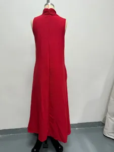 Back view of the solid red sleeveless loose long dress detail showing elegant drape and flow.