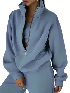 Casual fleece half-zip sweatshirt and sweatpants two-piece set detail view, comfortable street wear.